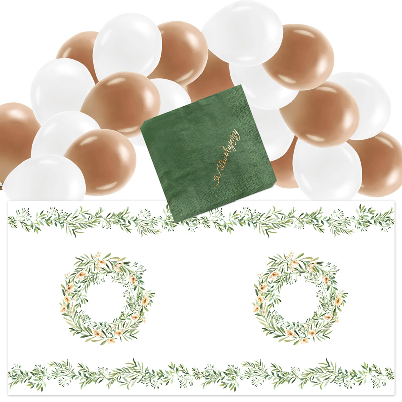 Dekoracje na przyjęcie w stylu boho - bieżnik serwetki i balony z motywem zielonych listków