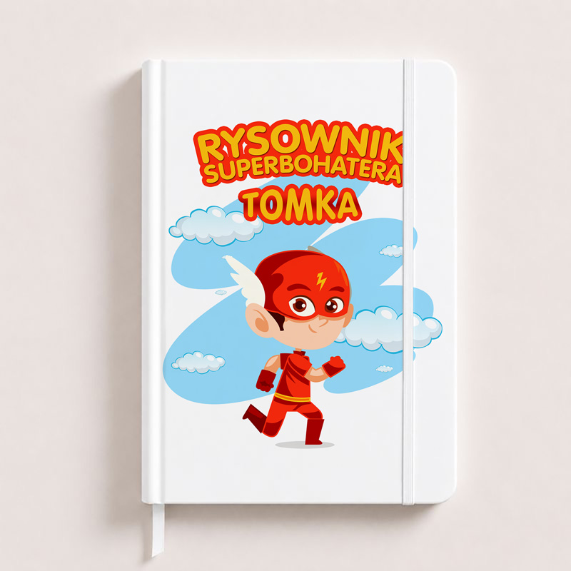 Notatnik z postacią superbohatera w czerwonym kostiumie, z błyskawicą na piersi, otoczonym chmurkami i napisem "RYSOWNIK SUPERBOHATERA TOMKA".