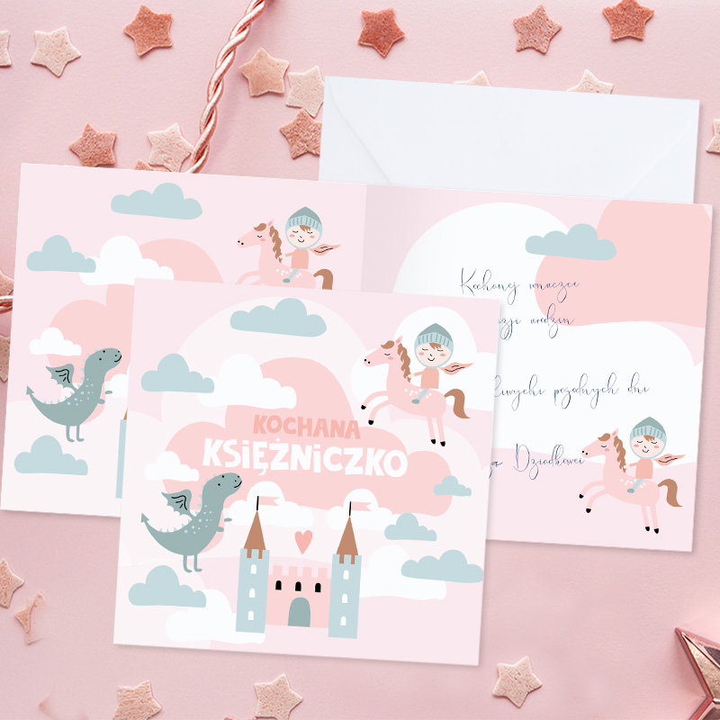 Kartka urodzinowa dla dziewczynki z wizerunkiem bajkowego, różowego królestwa do samodzielnego wypisania. Do kartki załączona jest biała koperta.