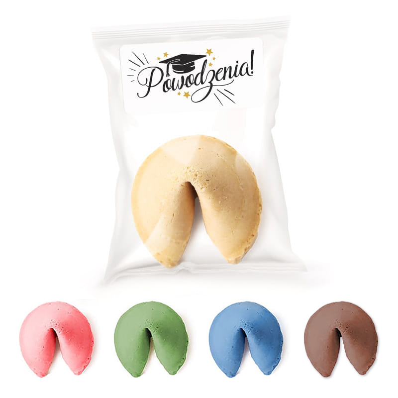 Opakowanie zawierające ciastko fortuny z napisem 'Powodzenia!' oraz pięć ciastków w różnych kolorach: różowym, zielonym, niebieskim, brązowym i klasycznym żółtym, które są ułożone obok siebie.