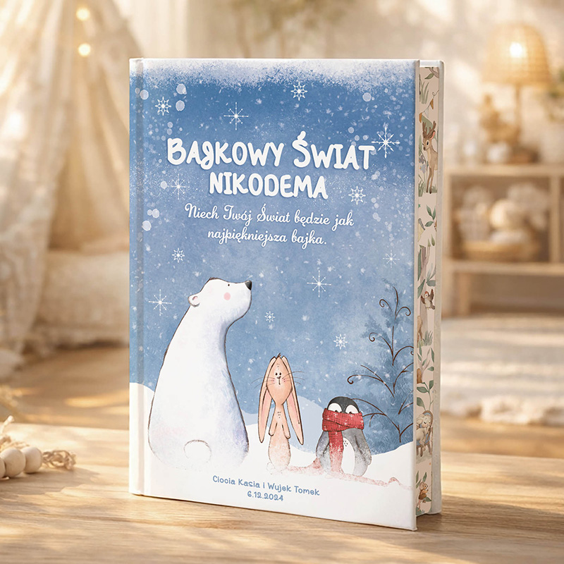 Książka z tytułem "Bagdowy Świat Nikodema" z ilustracjami białego misia, zająca i lisa na tle zimowego krajobrazu.