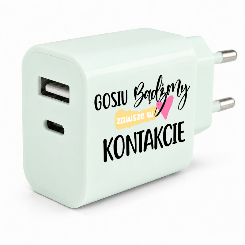 Biały ładowarka z napisami „GOSIU BądźMY zawsze w KONTAKCIE” oraz symbolem serca.