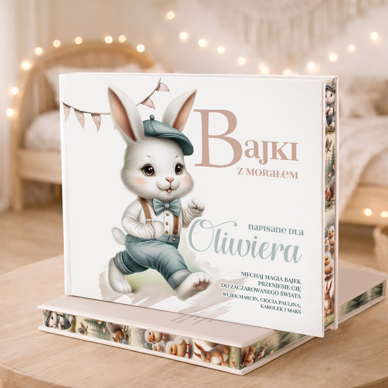 Książka "Bajki z morałem" z uroczym króliczkiem w kapeluszu i napisem "napisane dla Oliwiera".