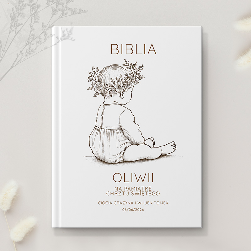 Okładka książki z rysunkiem małego dziecka siedzącego tyłem, z roślinnym wiankiem na głowie. Na górze napis 'BIBLIA', poniżej imię 'OLIWII', a dalej tekst 'NA PAMIĄTKĘ CHRZTU ŚWIĘTEGO', imiona 'CIOTKA GRAŻYNA I WUJEK TOMEK' oraz data '06/06/2026'.
