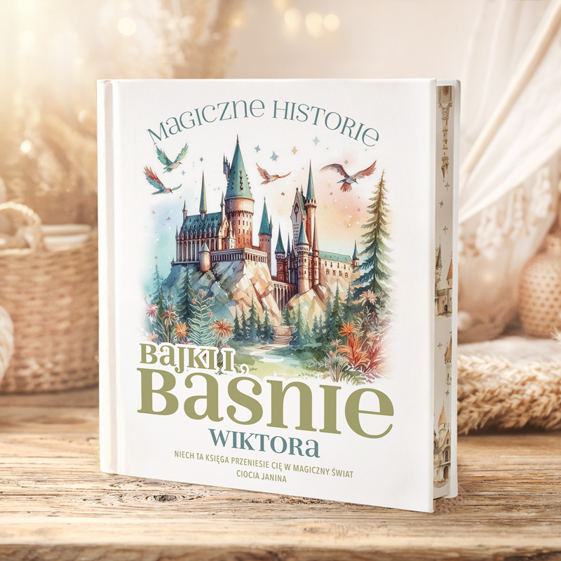 Książka ilustrowana „Bajki, Baśnie Wiktora” z zamkiem, ptakami i elementami przyrody w tle.