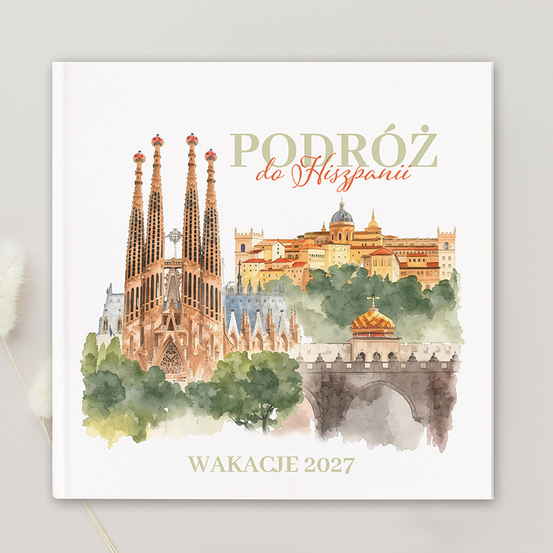 Książka z okładką przedstawiającą architekturę Hiszpanii z napisem "Podróż do Hiszpanii" i datą.