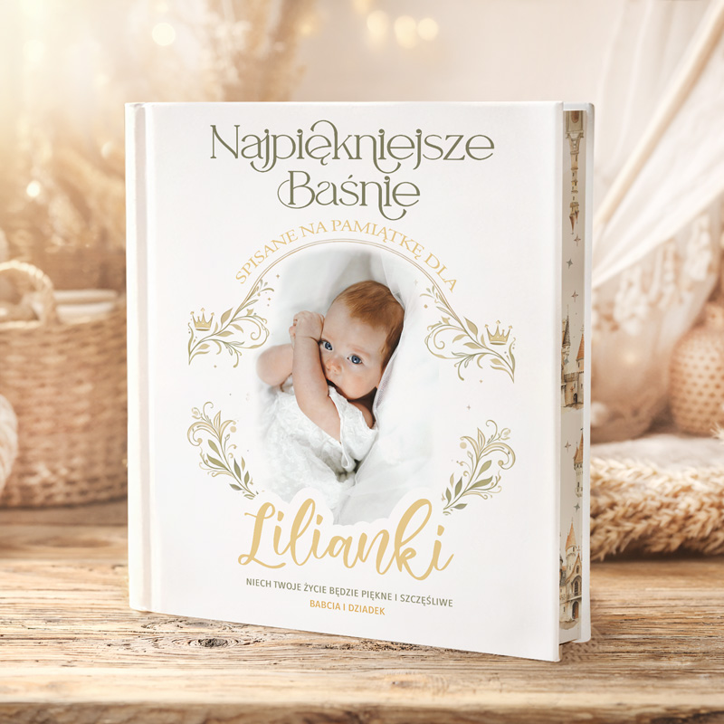 Okładka książki z tytułem "Najpiękniejsze Baśnie", z zdjęciem dziecka w białej sukience, otoczonym dekoracyjnym ramkiem.