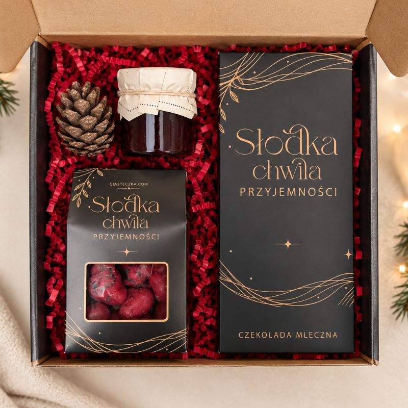 Elegancki zestaw prezentowy na Boże Narodzenie wyróżnia się czarno-złotymi opakowaniami z napisem „Słodka chwila przyjemności”.