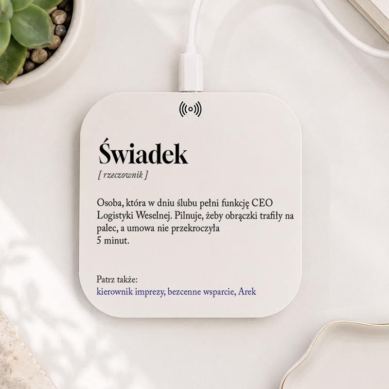 Świadełek z definicją: osoba pełniąca funkcje CEO Logistyki Weselnej, odpowiedzialna za obrazki na palcu w ciągu 5 minut.