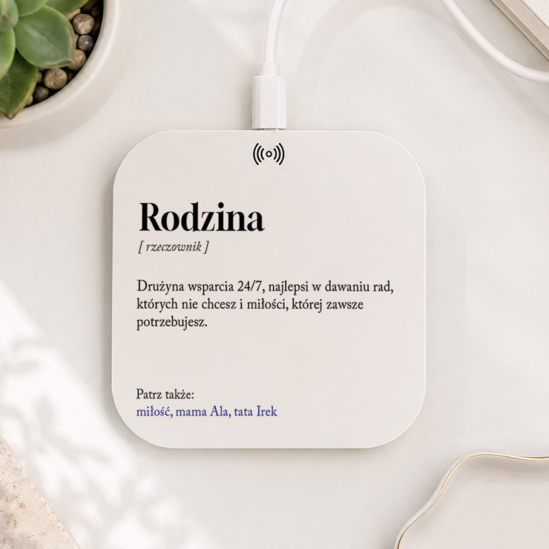 Ładowarka indukcyjna z napisem "Rodzina" i definicją.